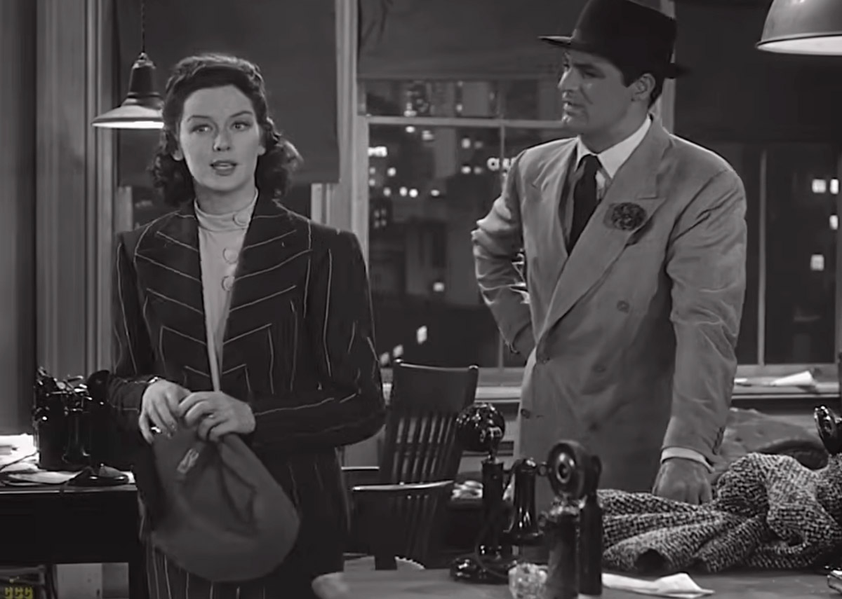 Hildy Johnson and Walter Burns standing together in the newspaper office